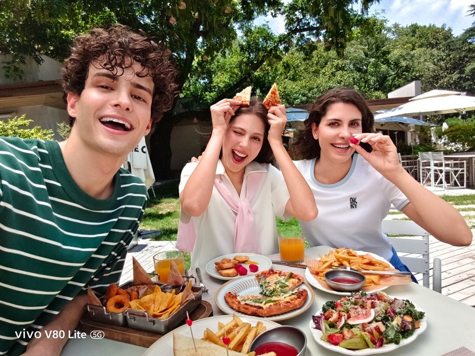 Group selfie captured with the vivo V80 Lite 5G wide-angle front camera