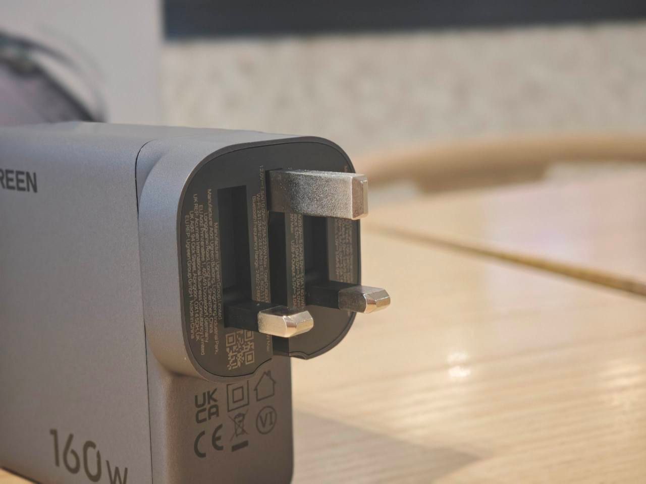 Close view of the UGREEN Nexode Pro charger's fully extended UK plug